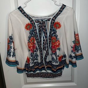 A white short sleeve cropped summer shirt